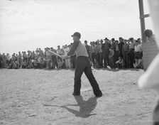 Ball game, Shafter migrant camp, California, 1938. Creator: Dorothea Lange