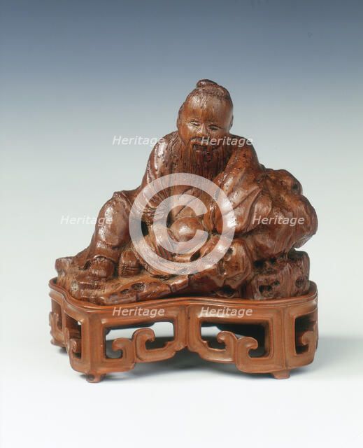 Bamboo carving of a scholar leaning against a rock, China, c1662-c1722. Artist: Unknown