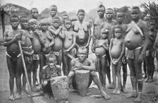 Bambute Pygmy group with two Walese women, 1902