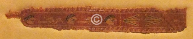 Band Fragment with Masks, Lotus Flowers, and Birds, Coptic, 400-700. Creator: Unknown.