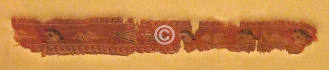 Band Fragment with Masks, Lotus Flowers, and Birds, Coptic, 400-700. Creator: Unknown.