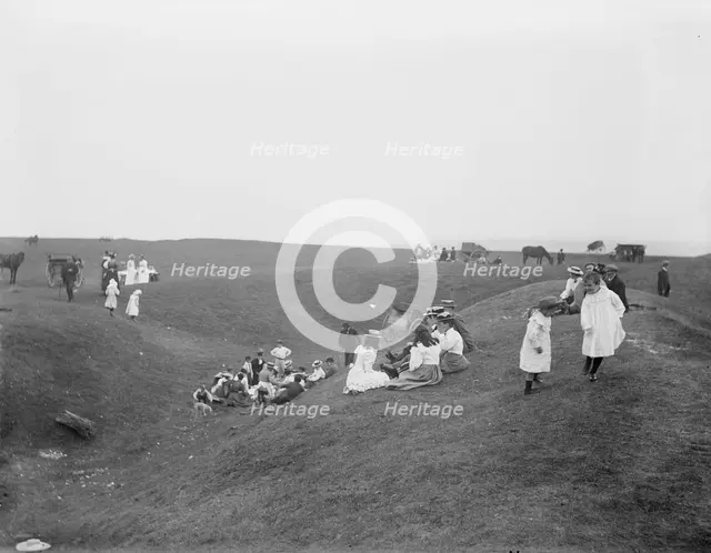 Bank Holiday picnic on the earthwork remains on White Horse Hill, Uffington, Oxfordshire, 1860-1922. Creator: Henry Taunt.