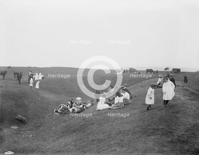 Bank Holiday picnic on the earthwork remains on White Horse Hill, Uffington, Oxfordshire, 1860-1922. Creator: Henry Taunt.