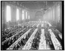 Banquet in Alumni Hall i.e., University Commons, Yale College, between 1900 and 1906. Creator: Unknown