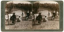 Baptising in the River Jordan, Palestine, 1903.Artist: Underwood & Underwood