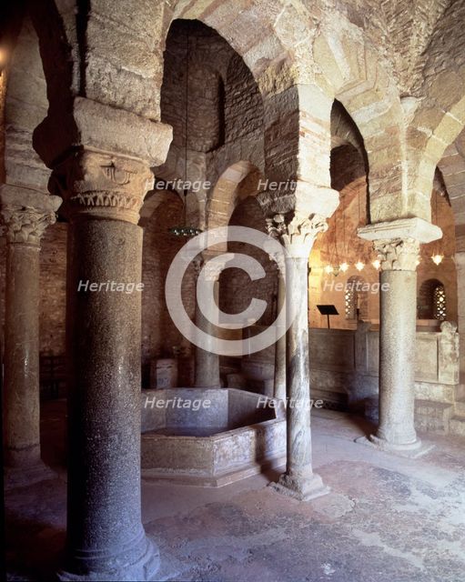 Baptistery of San Miguel de Egara in Terrassa, interior view with columns arranged around the font.