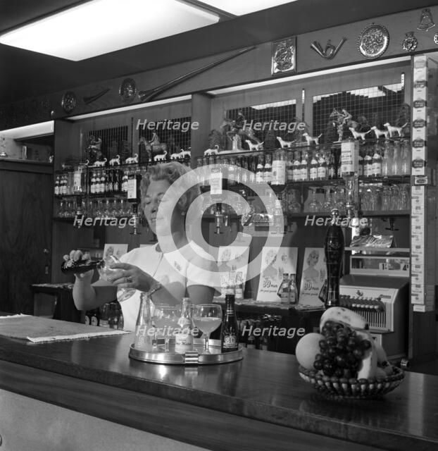 Bar of the Cavalier pub, Ravenfield, near Rotherham, South Yorkshire, 1963. Artist: Michael Walters