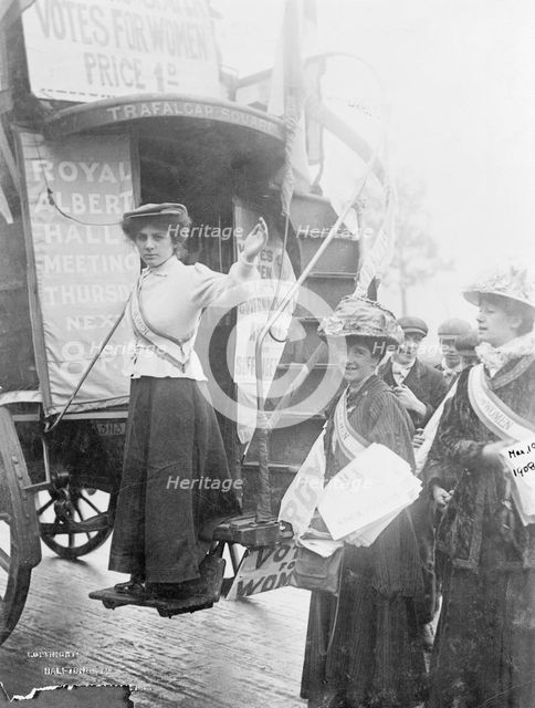 Barbara Ayrton on the bottom stair of the Votes for Women bus, October 1909.  Creator: Unknown.