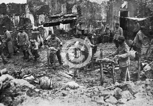 Barbed wire spooling, the defence of Verdun, France, First World War, 1916, (c1920). Artist: Unknown