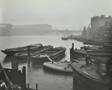 Barges moored at Bankside wharves looking downstream, London, 1913