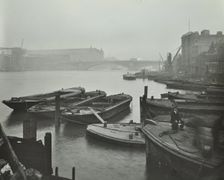 Barges moored at Bankside wharves looking downstream, London, 1913