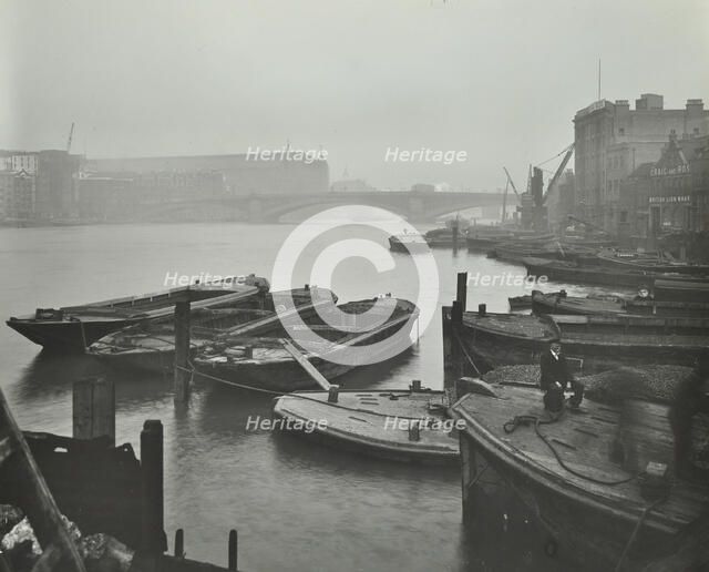 Barges moored at Bankside wharves looking downstream, London, 1913.  Artist: Unknown.