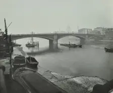 Barges at Bankside, looking upstream towards Southwark Bridge, London, 1913