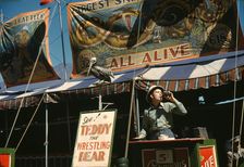 Barker at the grounds at the Vermont state fair, Rutland, 1941. Creator: Jack Delano