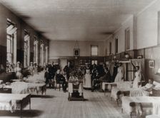Baron Lister (seated) with his staff, Victoria ward, King's College Hospital, Lincoln's..., 1893. Creator: Unknown
