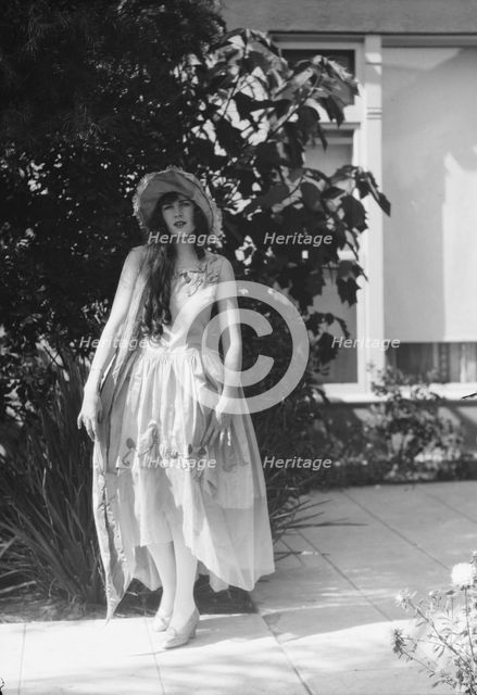 Barnett, Sally, Miss, standing outdoors, 1927 Creator: Arnold Genthe.