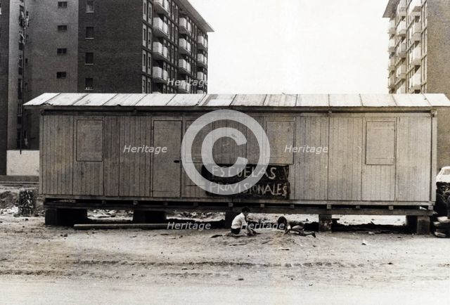 Barracks installed in San Adrián in Southwest of the Besòs river, provisionally used as schools, …