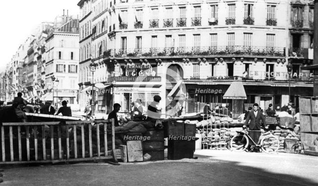 Barricade on the Rue de Chateaudun, liberation of Paris, August 1944. Artist: Unknown