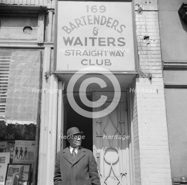 Bartenders' and waiters' club entrance in the Harlem area, New York, 1943. Creator: Gordon Parks.