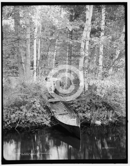 Bartlett's carry, Round Lake, Adirondack Mountains, (1902?). Creator: William H. Jackson.