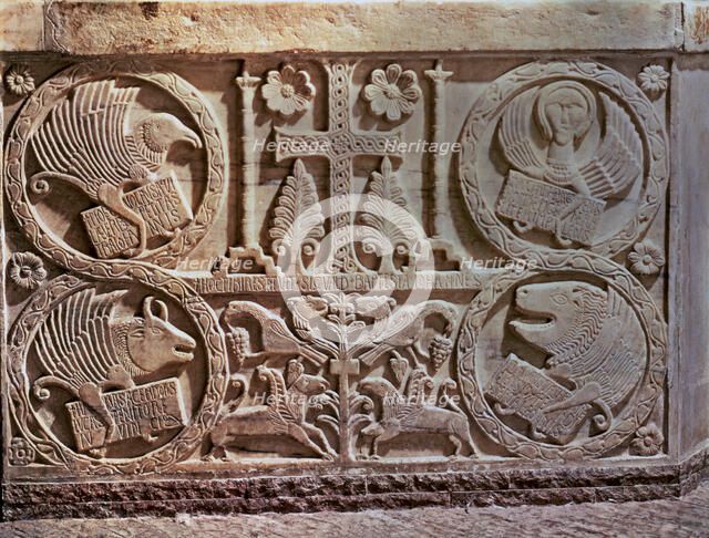 Bas-relief from the Baptistery of Saint Calixto (737-756). Detail of stucco with the symbols of t…