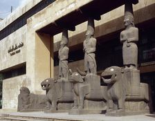 Basalt caryatids at the entrance to the National Museum of Aleppo, Syria, 2001. Creator: LTL