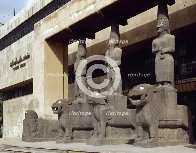 Basalt caryatids at the entrance to the National Museum of Aleppo, Syria, 2001. Creator: LTL.