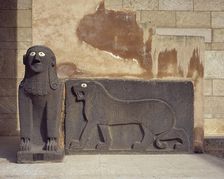 Basalt sphinx and a lion in relief, guarding the Temple of Tell Halaf, c6100 to 5400 BC. Creator: Unknown
