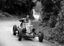 Basil Davenport driving a GN Spider Special at the Wiscombe Park Hill, Climb, Devon. Creator: Unknown