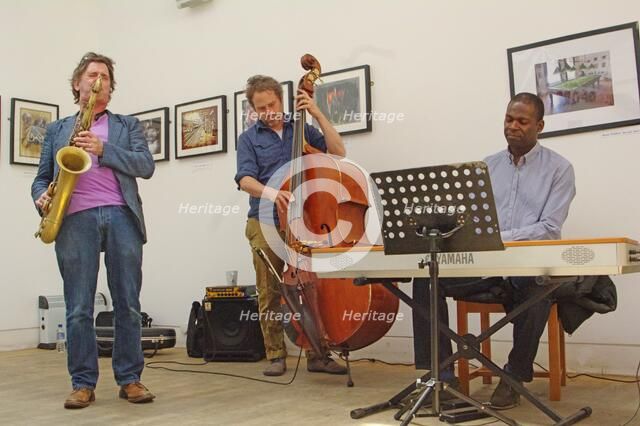 Basil Hodge, Ed Jones and Riaan Vosloo, Clock Tower Cafe, Croydon, London, 2015. Artist: Brian O'Connor.
