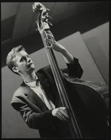 Bassist Arnie Somogyi playing at The Fairway, Welwyn Garden City, Hertfordshire, 28 April 1991. Creator: Denis Williams