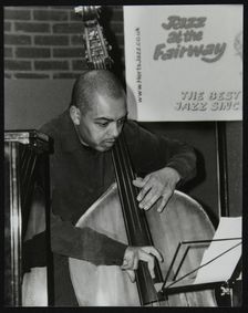 Bassist Gary Crosby playing at The Fairway, Welwyn Garden City, Hertfordshire, 25 January 2004. Creator: Denis Williams