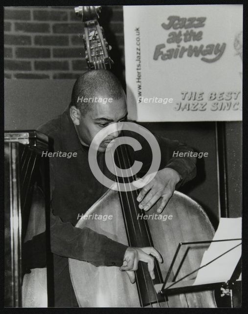 Bassist Gary Crosby playing at The Fairway, Welwyn Garden City, Hertfordshire, 25 January 2004. Creator: Denis Williams.