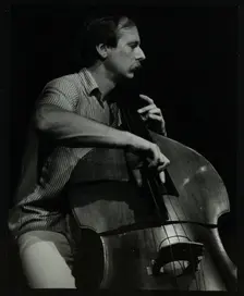 Bassist Paul Bridge playing at The Stables, Wavendon, Buckinghamshire. Creator: Denis Williams