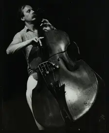 Bassist Paul Bridge playing at The Stables, Wavendon, Buckinghamshire. Creator: Denis Williams