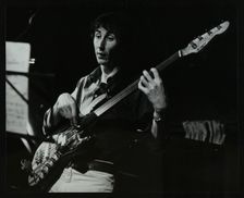 Bassist Steve Cook playing at The Stables, Wavendon, Buckinghamshire. Creator: Denis Williams