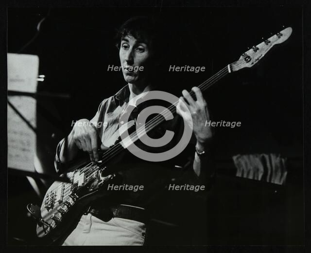 Bassist Steve Cook playing at The Stables, Wavendon, Buckinghamshire. Artist: Denis Williams