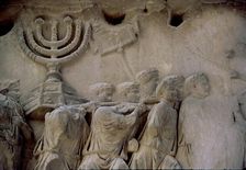 Basrelief in the Arch of Titus representing men carrying a menorah, located in the Via Sacra of t…