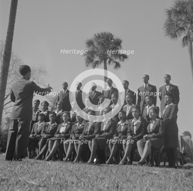 Bethune-Cookman College. Student choir singing on the campus, Daytona Beach, Florida, 1943. Creator: Gordon Parks.