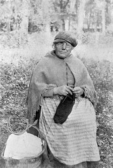 Beti Ty Mwd in front of Glynllifon House Lodge, c1920. Creator: Unknown