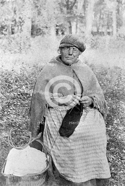 Beti Ty Mwd in front of Glynllifon House Lodge, c1920. Creator: Unknown.