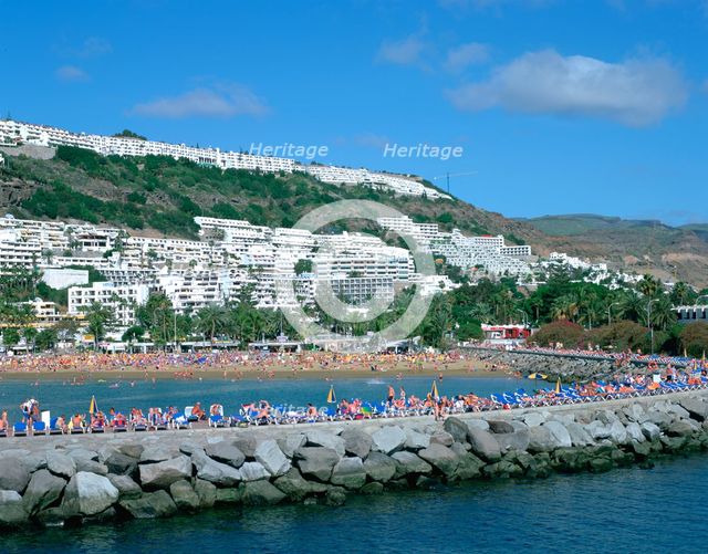 Beach and breakwater, Puerto Rico, Gran Canaria, Canary Islands. Creator: Peter Thompson.