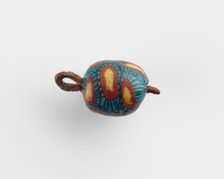 Bead, with a copper eyelet, Roman Period, 1st-2nd century. Creator: Unknown