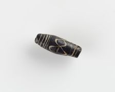 Bead, with a longitudinal bore. Cracked, 6th century. Creator: Unknown