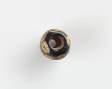 Bead, with a large conical bore, 6th century. Creator: Unknown