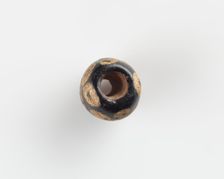 Bead, with a large conical bore, 6th century. Creator: Unknown
