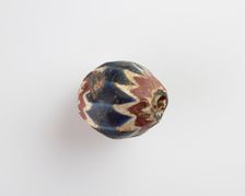 Bead, egg-shaped, with chamfered sides. Two sides chipped away, 13th-14th centuries. Creator: Unknown