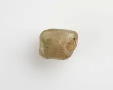Bead of irregular form; longitudinal bore, Roman Period, 30 BCE-395 CE. Creator: Unknown