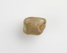 Bead of irregular form; longitudinal bore, Roman Period, 30 BCE-395 CE. Creator: Unknown
