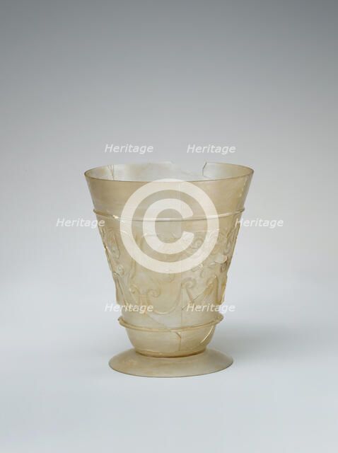 Beaker with Relief-cut Decoration, Iran, 9th-10th century. Creator: Unknown.